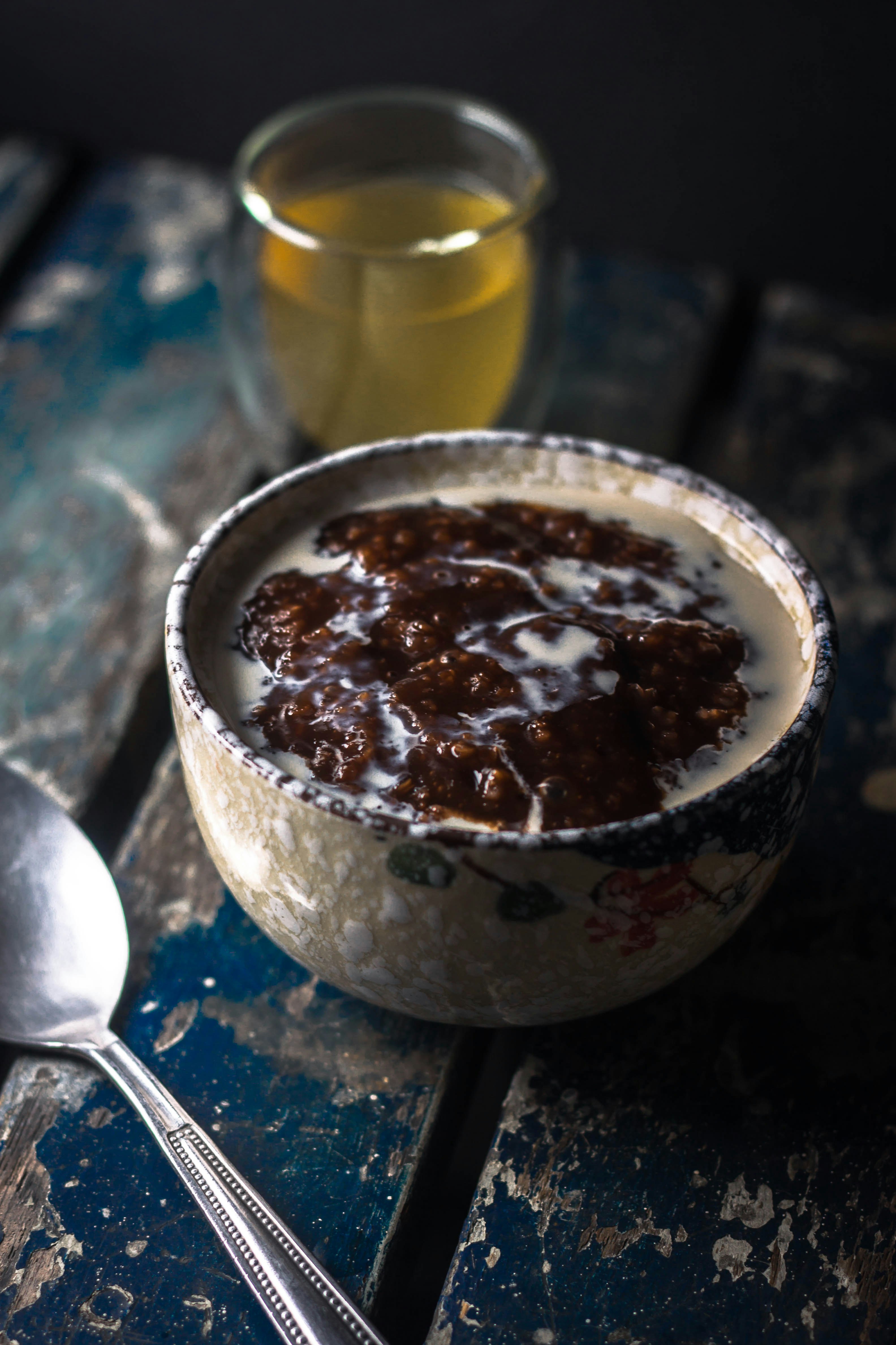 white bowl filled with white and brown liquid